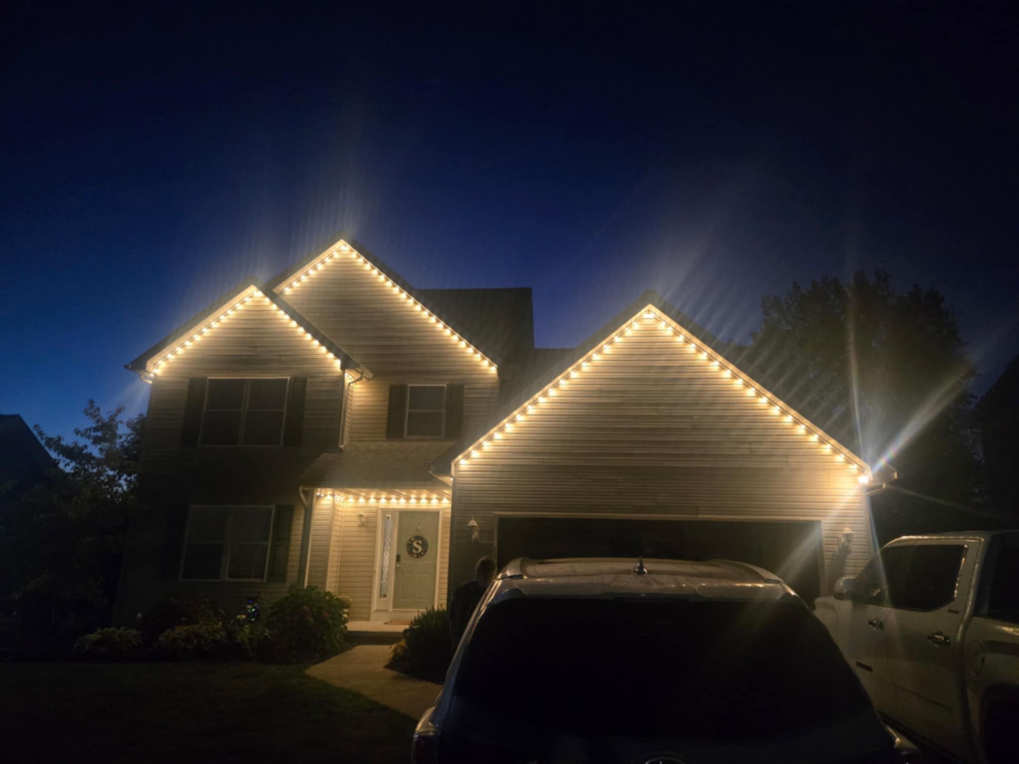 A real home with warm white permanent lighting